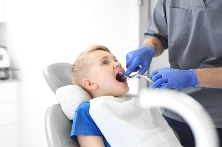 major signs that indicate a pediatric tooth extraction is needed